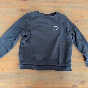 Kids Black Crewneck Sweatshirt with Small Circular Chest Graphic